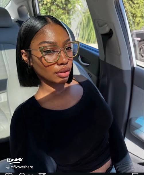 Sleek Black Bob with Deep Side Part Sleek Black Bob with Deep Side Part — Bob with Glasses