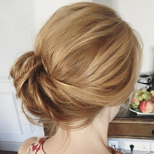 Loose Strands Light Brown Messy Bun — Messy Low Bun