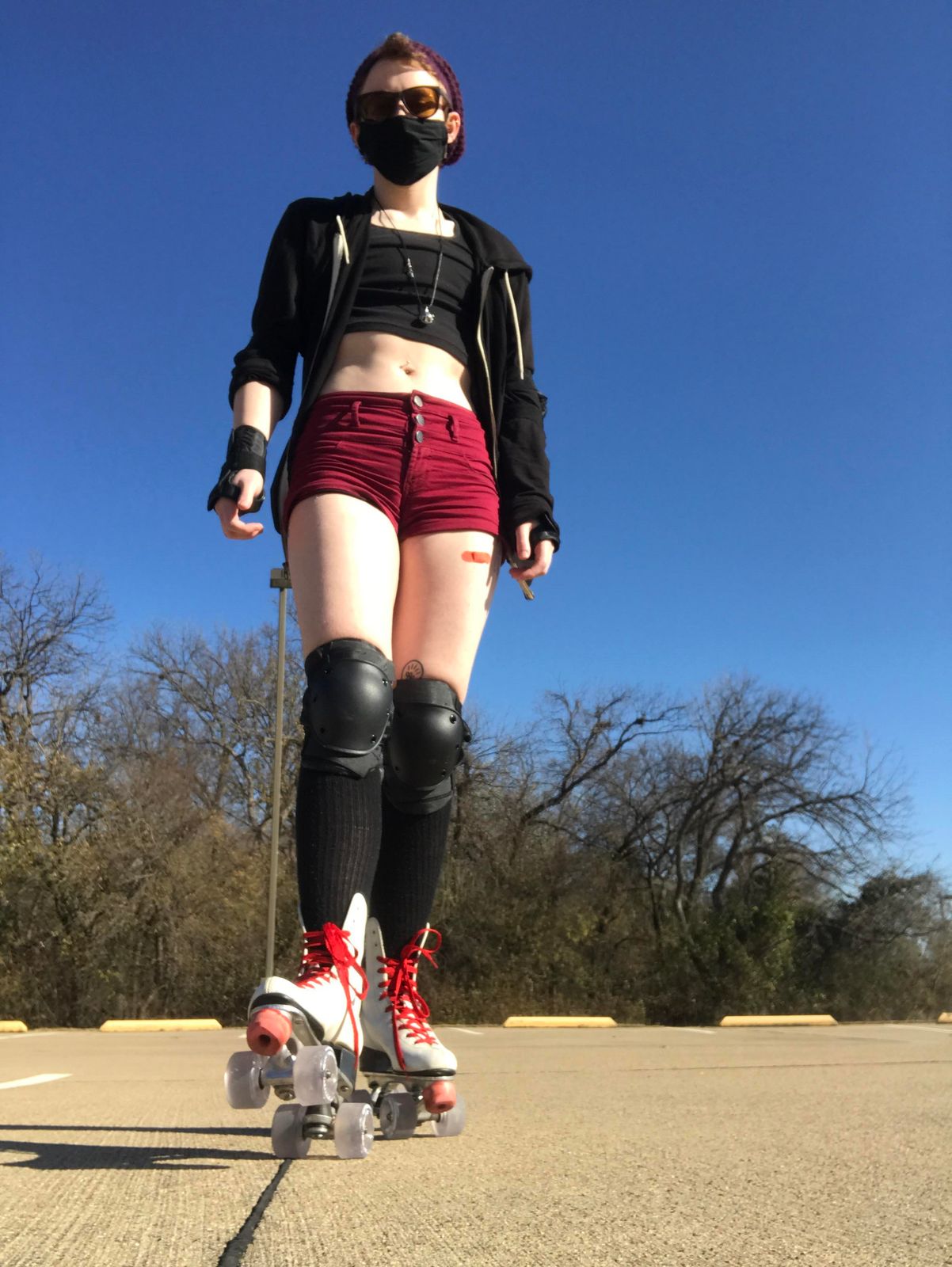 Hooded Jacket and Red Shorts for High-Contrast Skating — Roller Skating Outfits