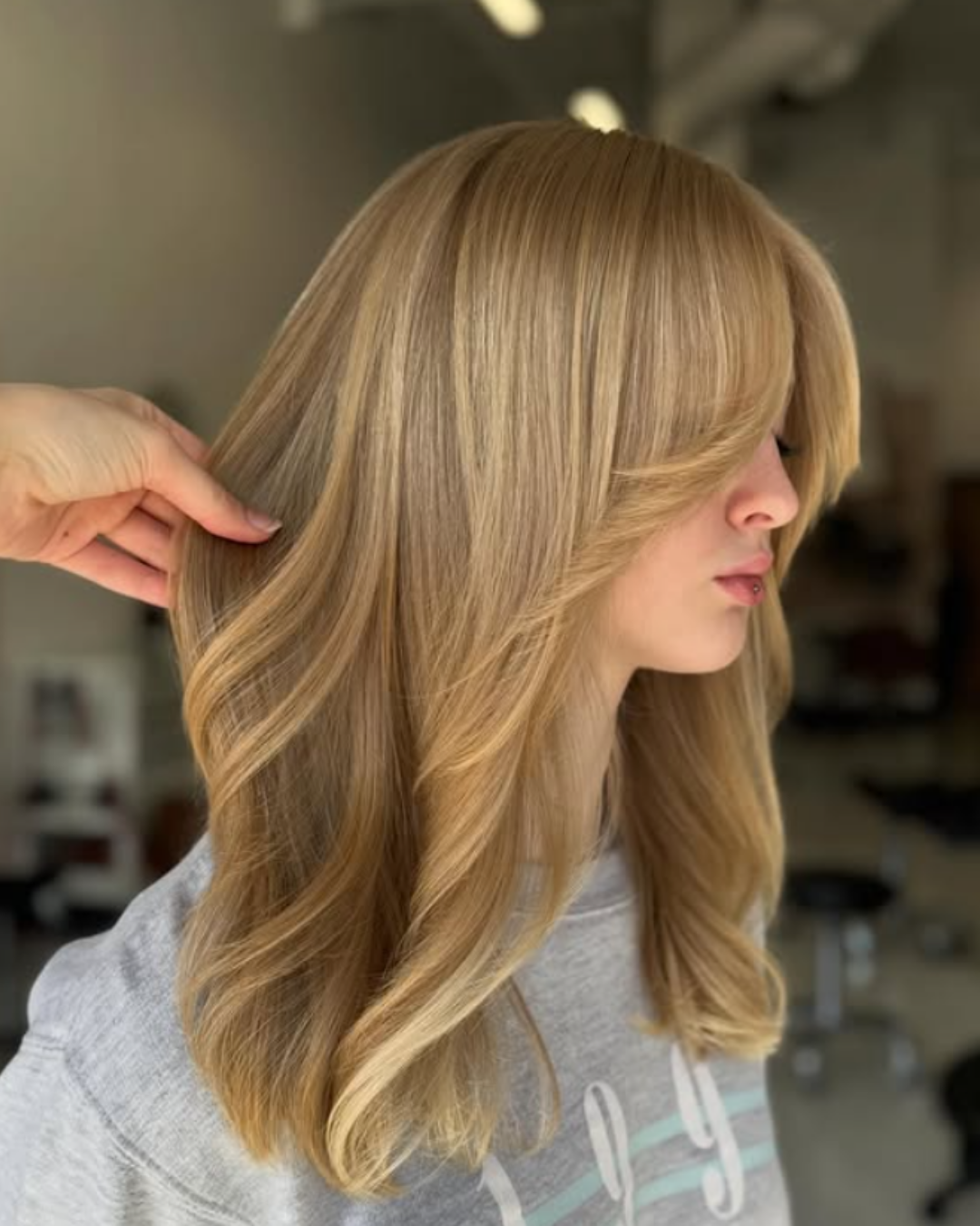 Ash Blonde Collarbone Layers With Curtain Bangs — Layered Hair