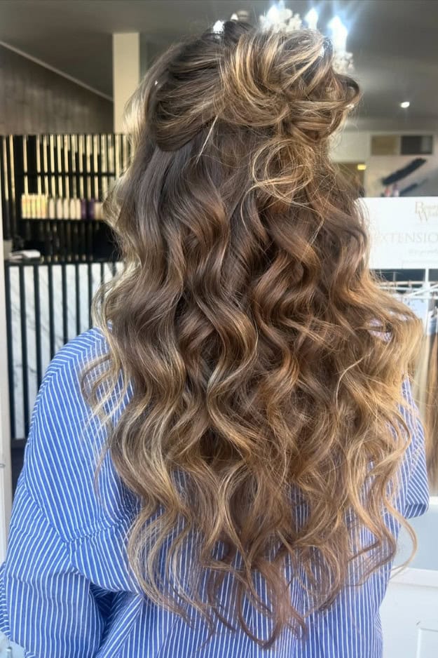 Brown Bun With Loose Waves Brown Bun With Loose Waves — Half Up Half Down Curly Hair