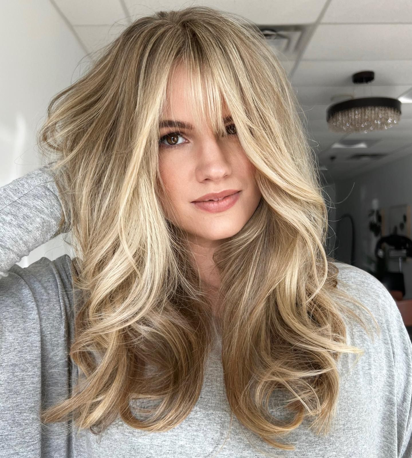 Chin-Length Bob With Curtain Bangs — Hairstyles for Big Forehead