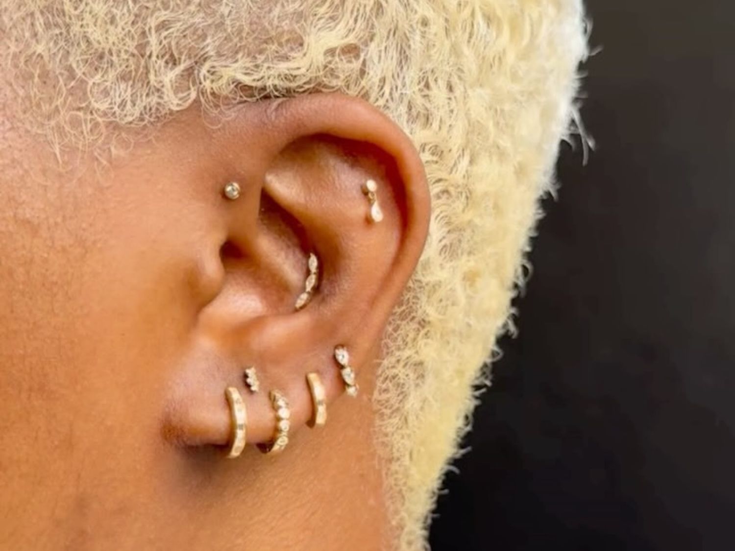 Modern Gold Earring Mix: Small Hoops and Teardrop Studs Modern Gold Earring Mix: Small Hoops and Teardrop Studs — Ear Piercing Ideas