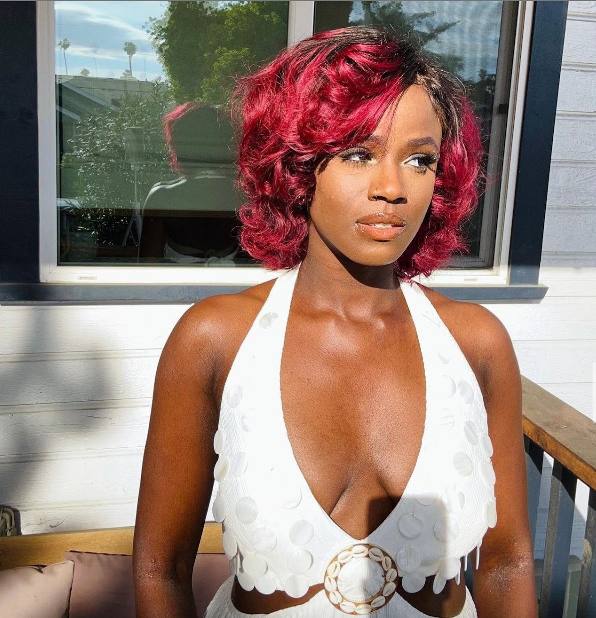 Vibrant Cherry Red Bob With Wispy Bangs Vibrant Cherry Red Bob With Wispy Bangs — Red and Black Hair
