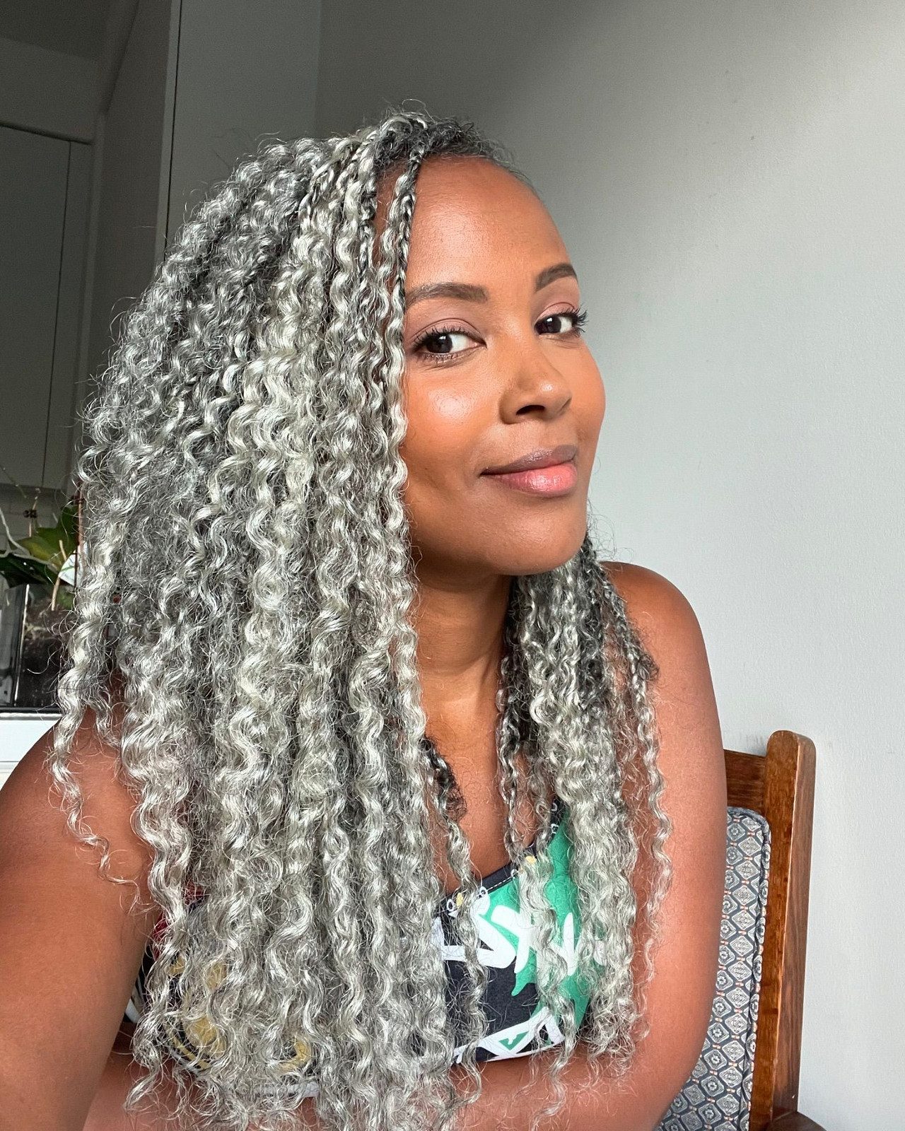 Gray Braids With Wavy Ends and Dark Roots