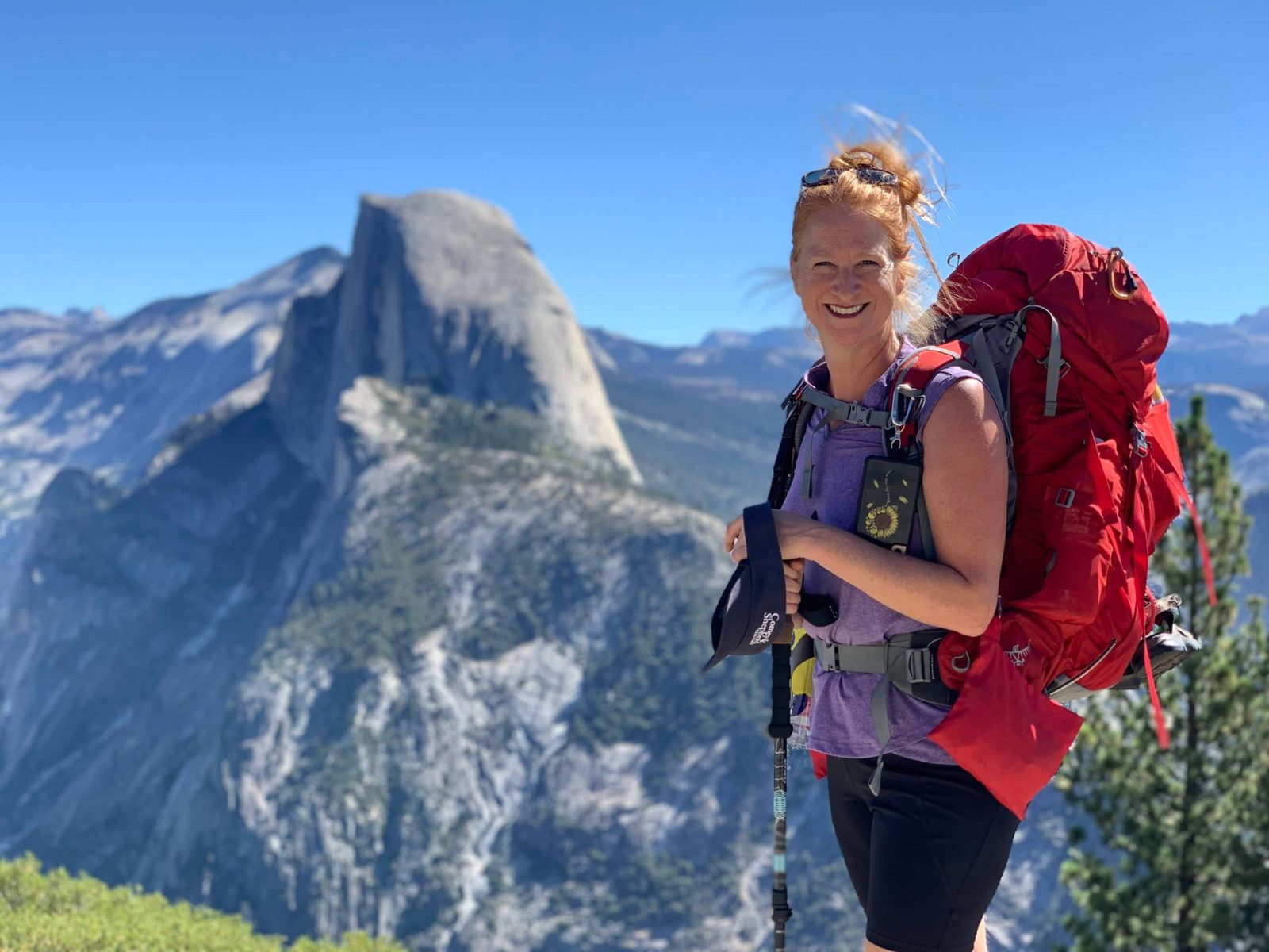 Backpacking Ready: Purple Tee, Black Shorts, and Red Backpack Backpacking Ready: Purple Tee, Black Shorts, and Red Backpack — Yosemite Outfits