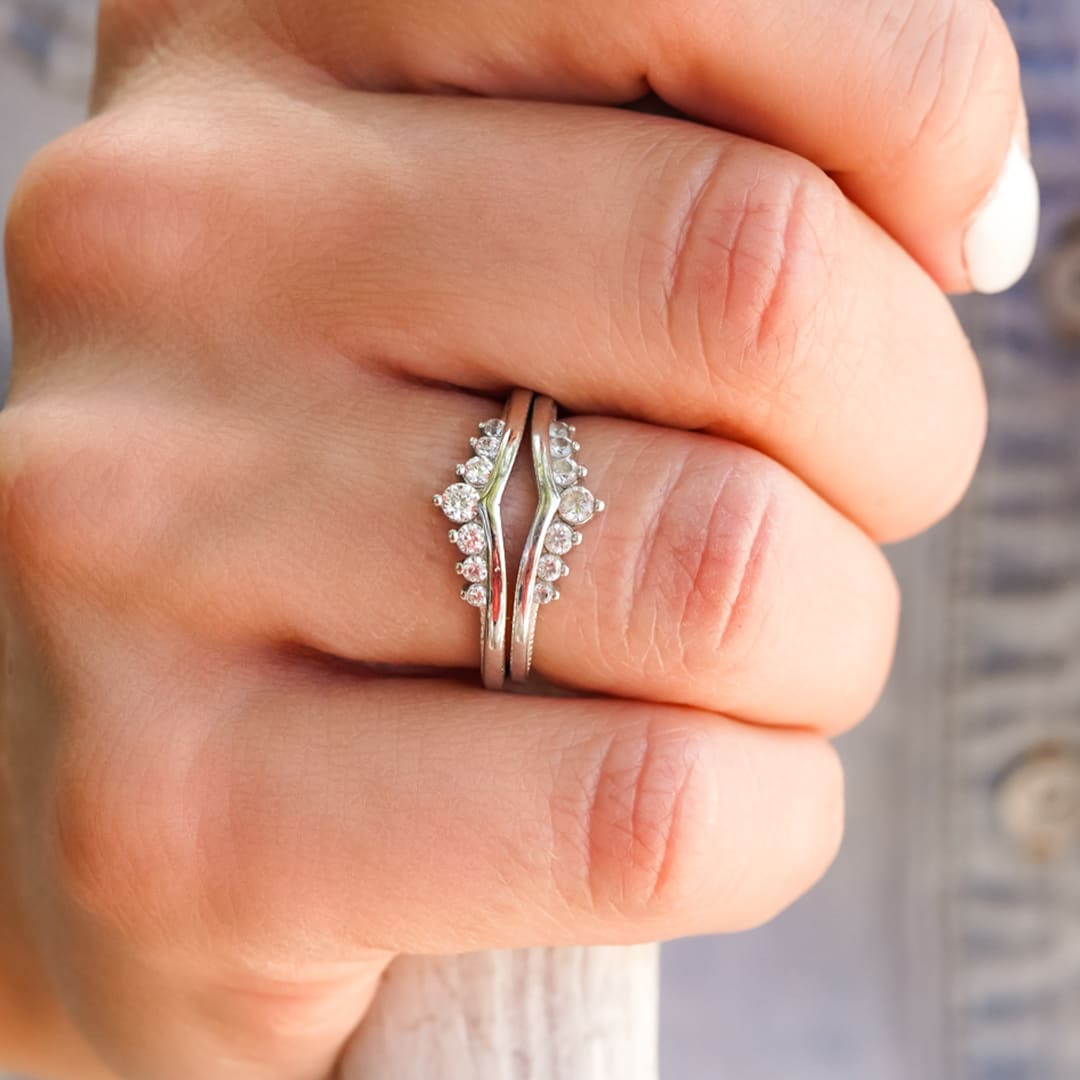 Intricate Silver Ring Stack with Detailed Metalwork