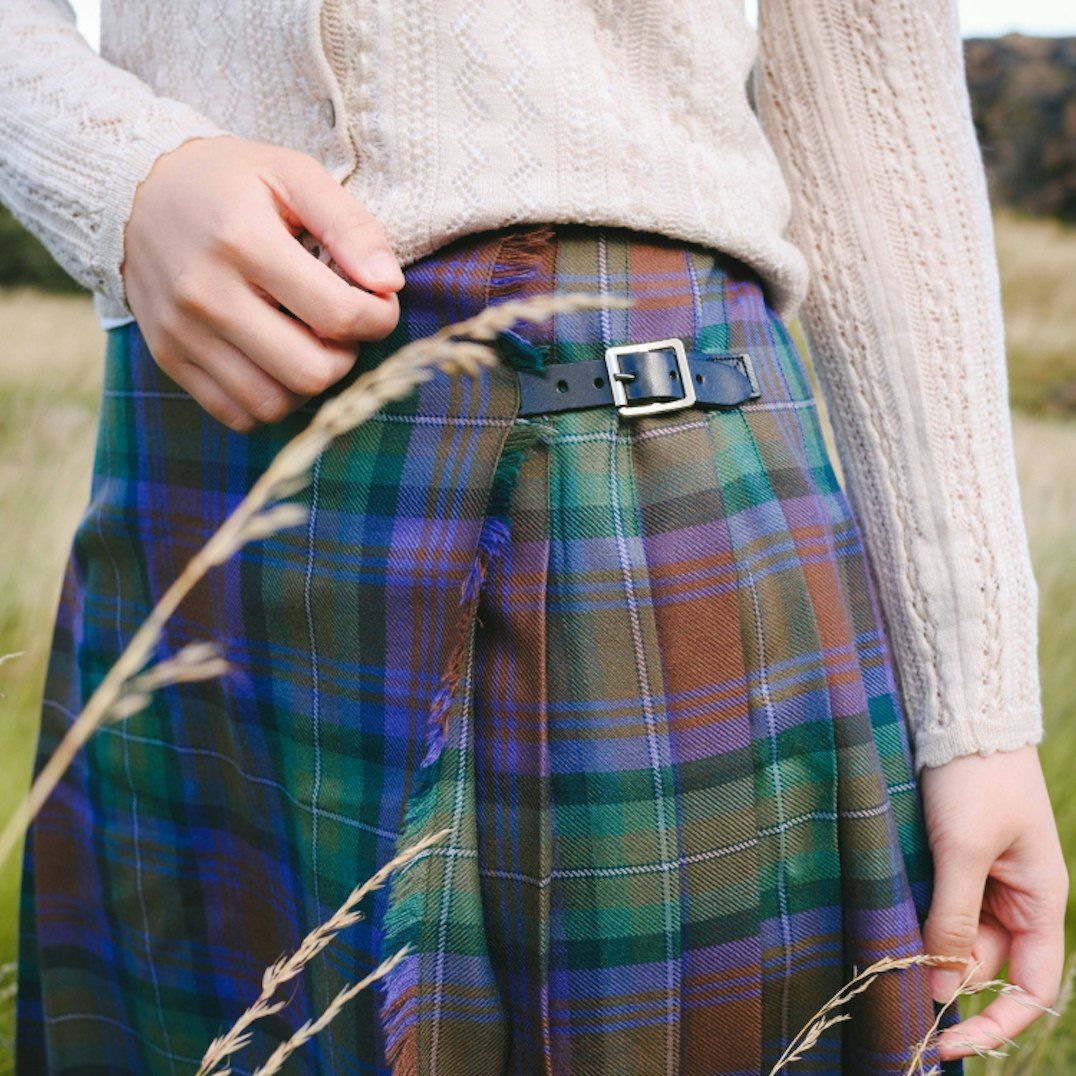 Authentic Kilted Plaid Skirt with Cable-Knit Cardigan Authentic Kilted Plaid Skirt with Cable-Knit Cardigan — Plaid Skirts