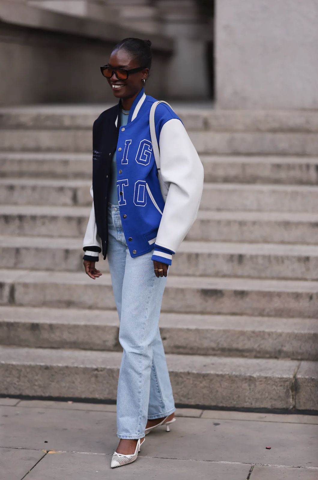 Varsity Jacket with Straight-Leg Jeans and Heels Varsity Jacket with Straight-Leg Jeans and Heels — Varsity Jacket Outfits
