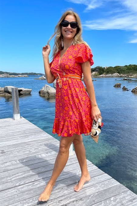 Vibrant Floral Wrap Dress for Daytime Vacation Fun — Tulum Outfits