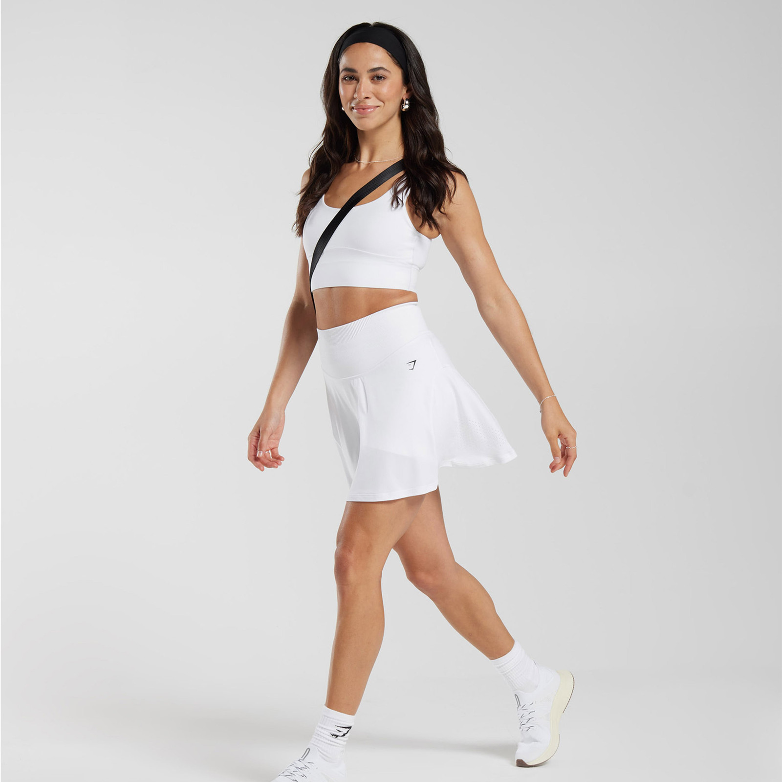 Cream Cable-Knit Sweater over Navy Polo for a Chic Tenniscore Combination — Tenniscore Outfits