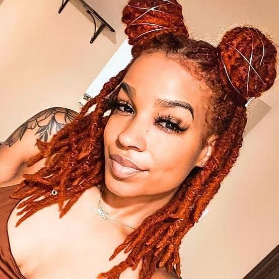 Red Locs Styled in Two Buns Red Locs Styled in Two Buns