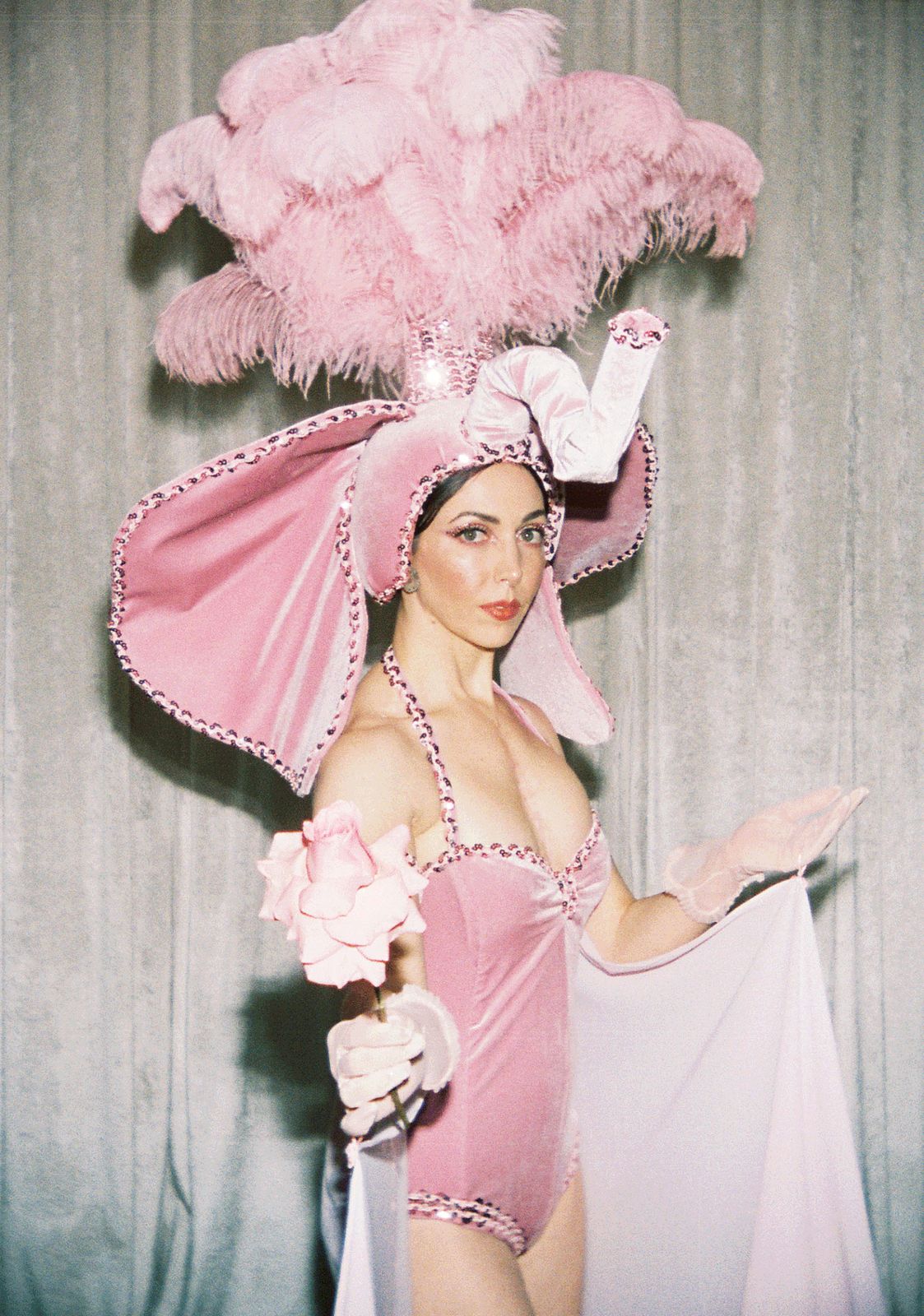 Showgirl Spectacle: Pink Sequins and Feathered Grandeur Showgirl Spectacle: Pink Sequins and Feathered Grandeur — Vegas Show Outfits