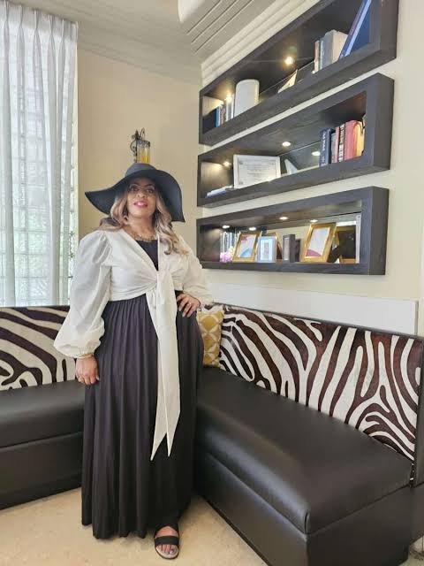Bohemian Vibes: White Tie-Front Blouse with Flowing Black Maxi Skirt — Black and White Outfits