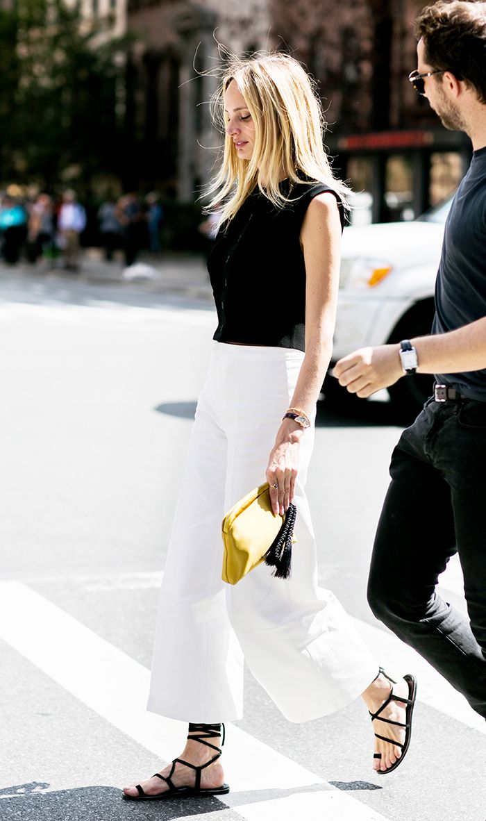 White Wide-Leg Pants with Yellow Clutch for a Pop of Color White Wide-Leg Pants with Yellow Clutch for a Pop of Color — Business Trip Outfits