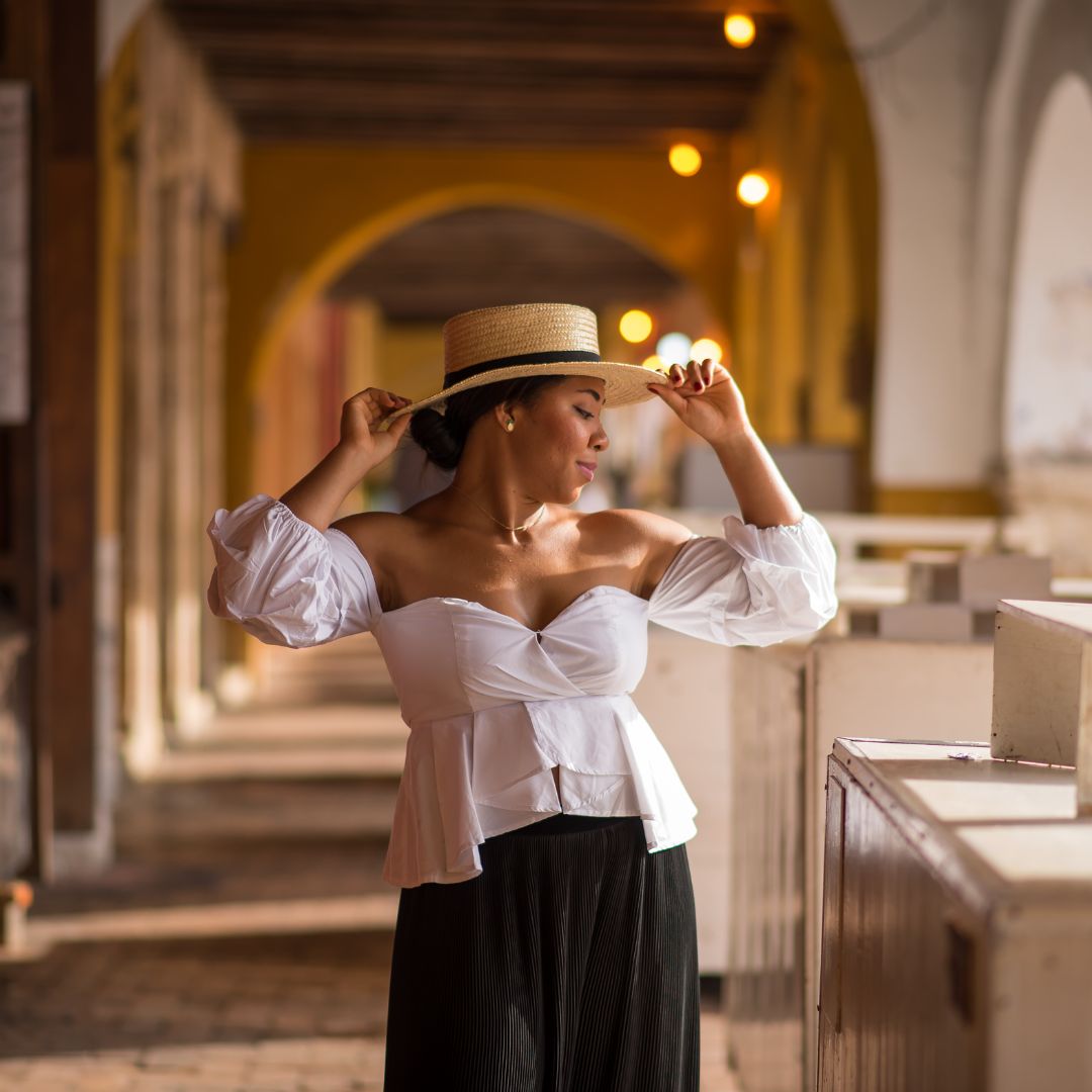 Dramatic Contrast: White Peasant Blouse with Black Wide-Leg Pants — Cartagena Outfits