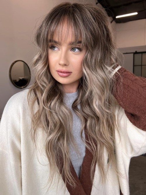 Shoulder-Length Layers With Blunt Bangs — Hairstyles for Big Forehead