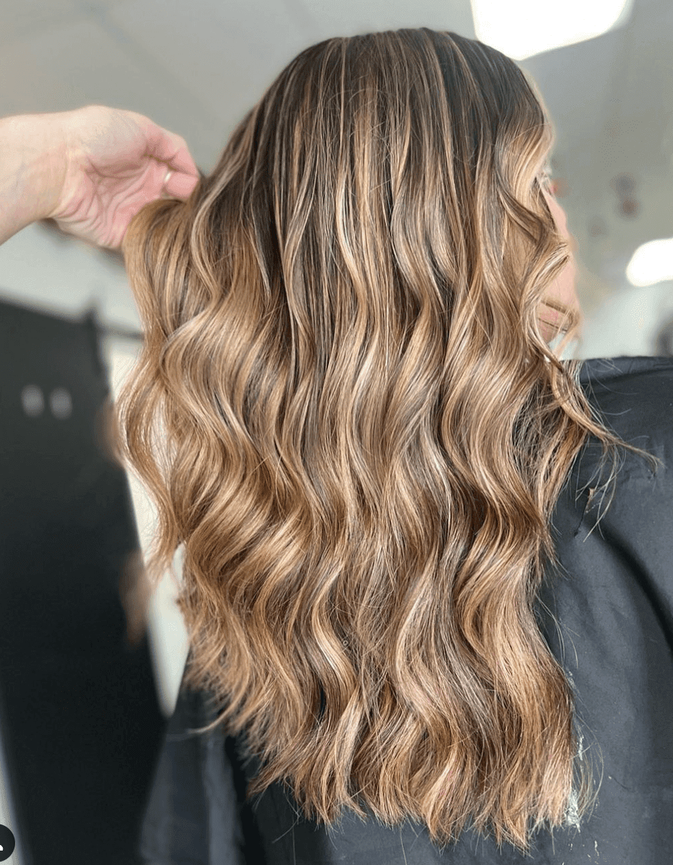 Mid-Back Sun-Kissed Caramel Balayage Ends