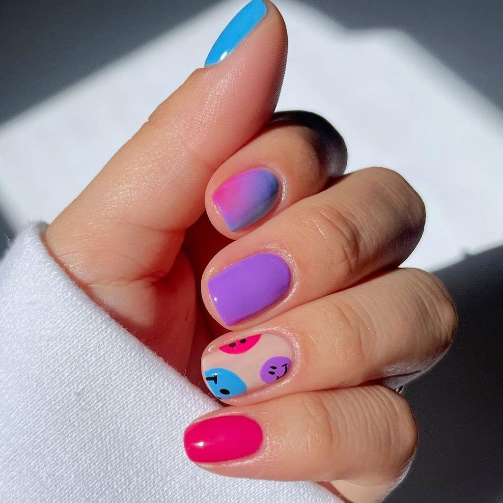Bright Solid Colors With Smiley Accents — Smiley Face Nails