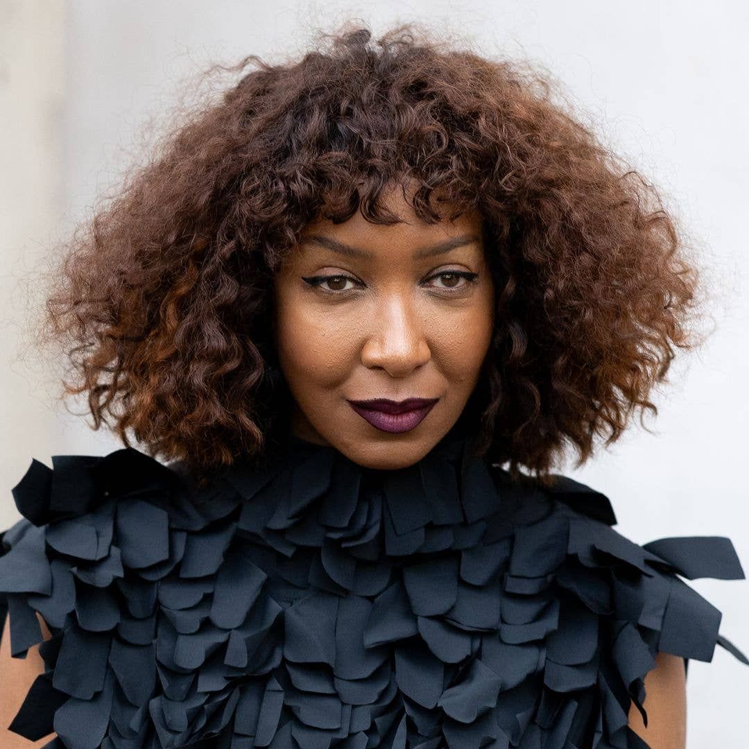 Dark Brown Bob With Full Bangs And Auburn Tones — Curly Bob