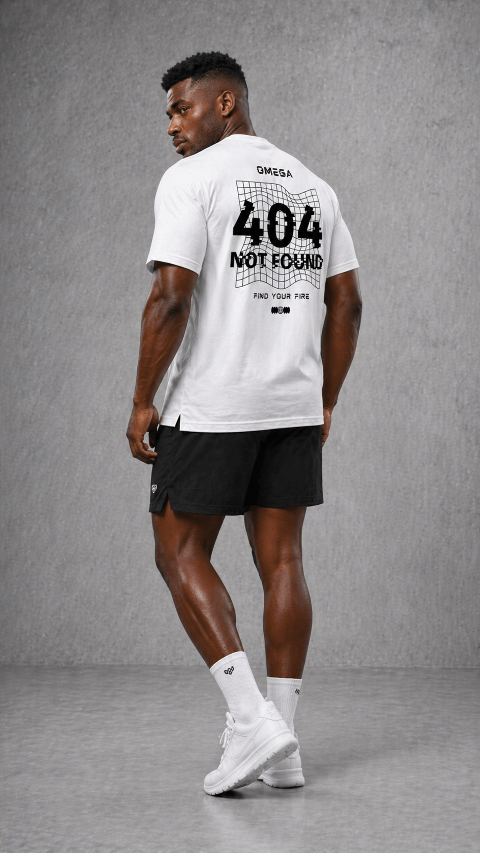 Graphic Back Detail: White Tee and Black Athletic Shorts — Mens Gym Outfits