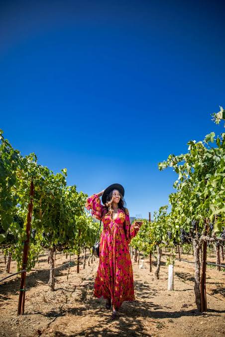 Bold Floral Maxi Dress with a Wide-Brim Hat for Vineyard Charm — Winery Outfits