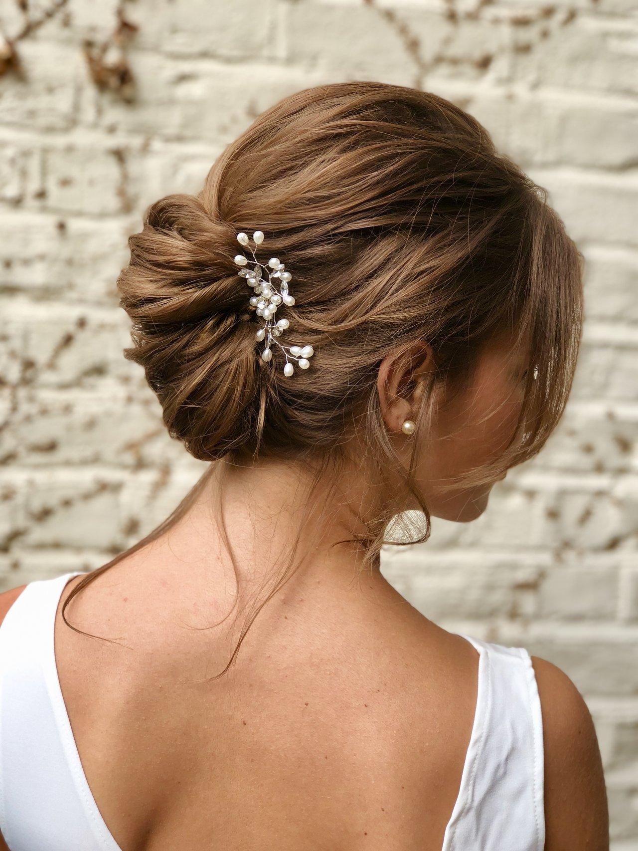 Textured Low Bun with Pearl Accessory Textured Low Bun with Pearl Accessory — Updos