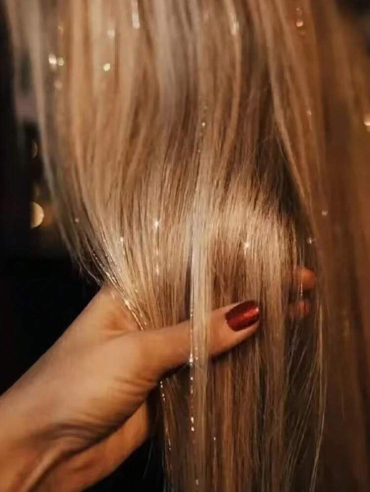 Silver Tinsel on Mid Back Blonde Hair — Hair Tinsel