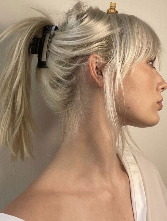 Platinum Blonde Ponytail with Blunt Bangs and Claw Clip — Ponytail with Bangs