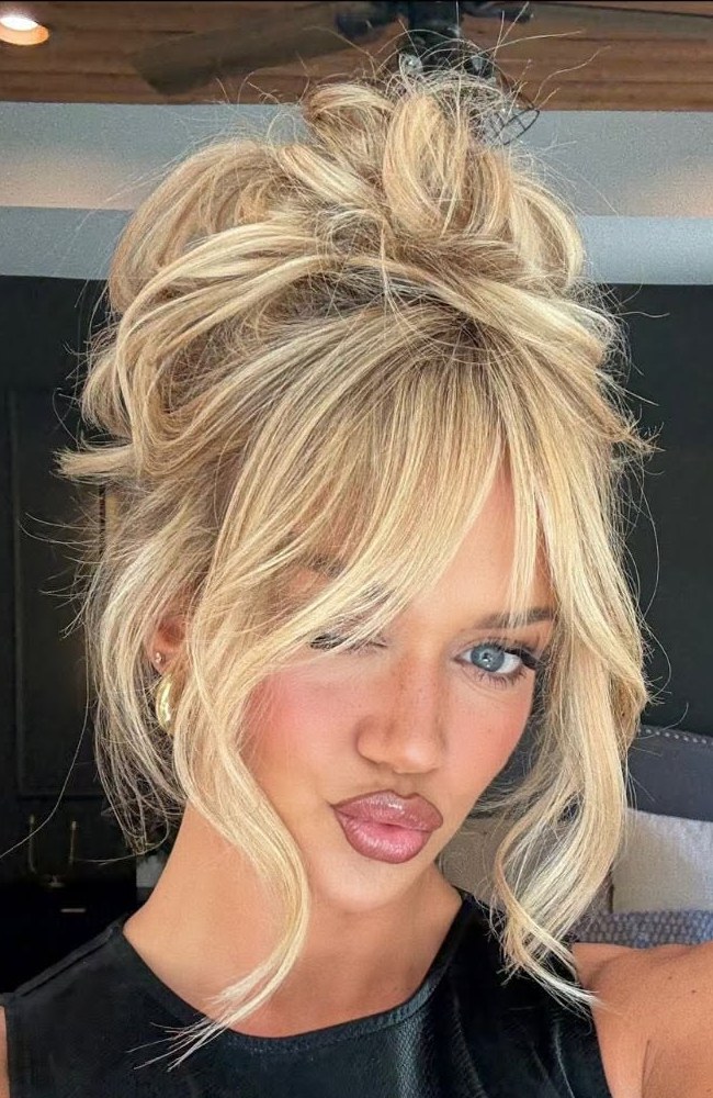 Messy High Bun With Curtain Bangs Messy High Bun With Curtain Bangs — Bun Hairstyles