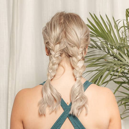 Blonde Dutch Braids Into Ponytails — Two Braids
