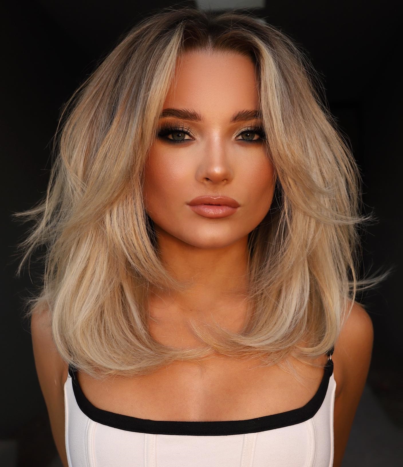 Collarbone Waves With Wispy Platinum Bangs Collarbone Waves With Wispy Platinum Bangs — Face Framing Layers