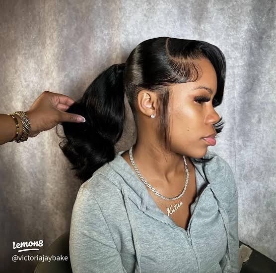 Black Ponytail With Face Framing Curls Black Ponytail With Face Framing Curls — Frontal Ponytail