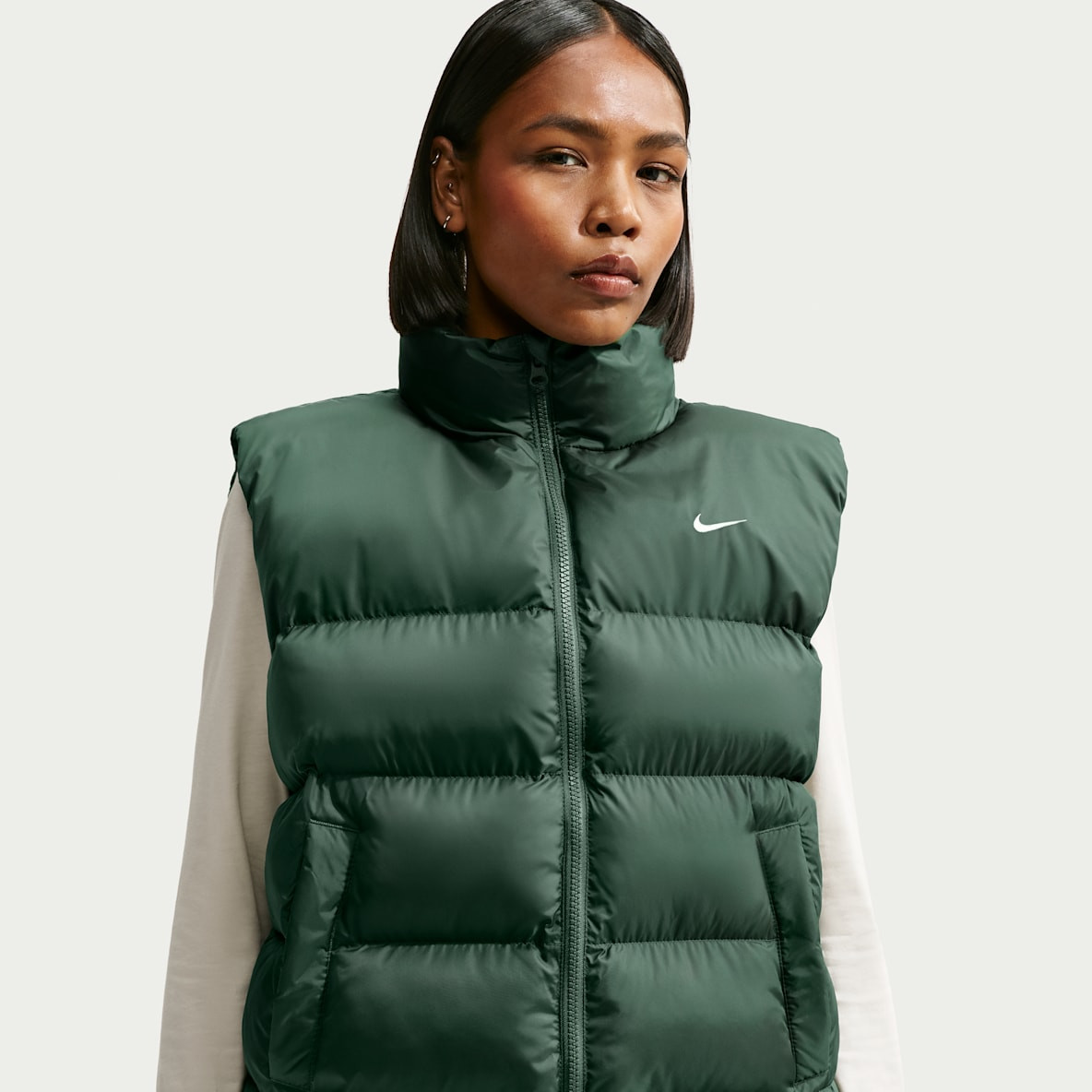Green Puffer Vest with Swoosh Logo for Casual Athleisure Green Puffer Vest with Swoosh Logo for Casual Athleisure — Vests