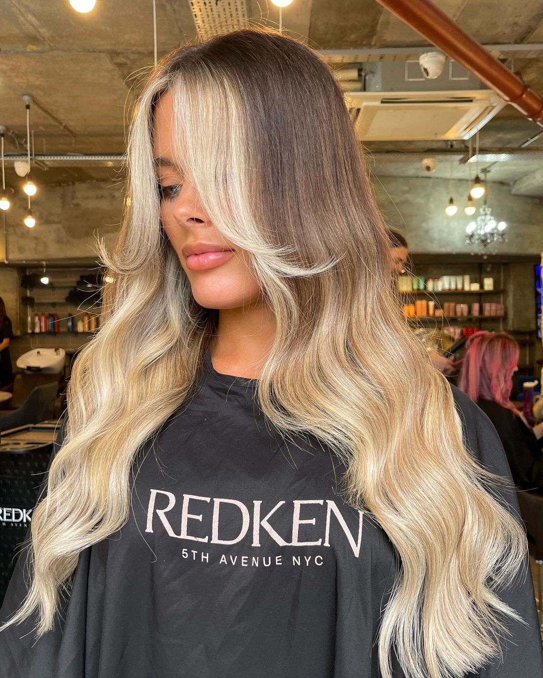 Salon Ready: Two-Toned Hair with Curtain Bangs and a Black Cape — Long Bangs