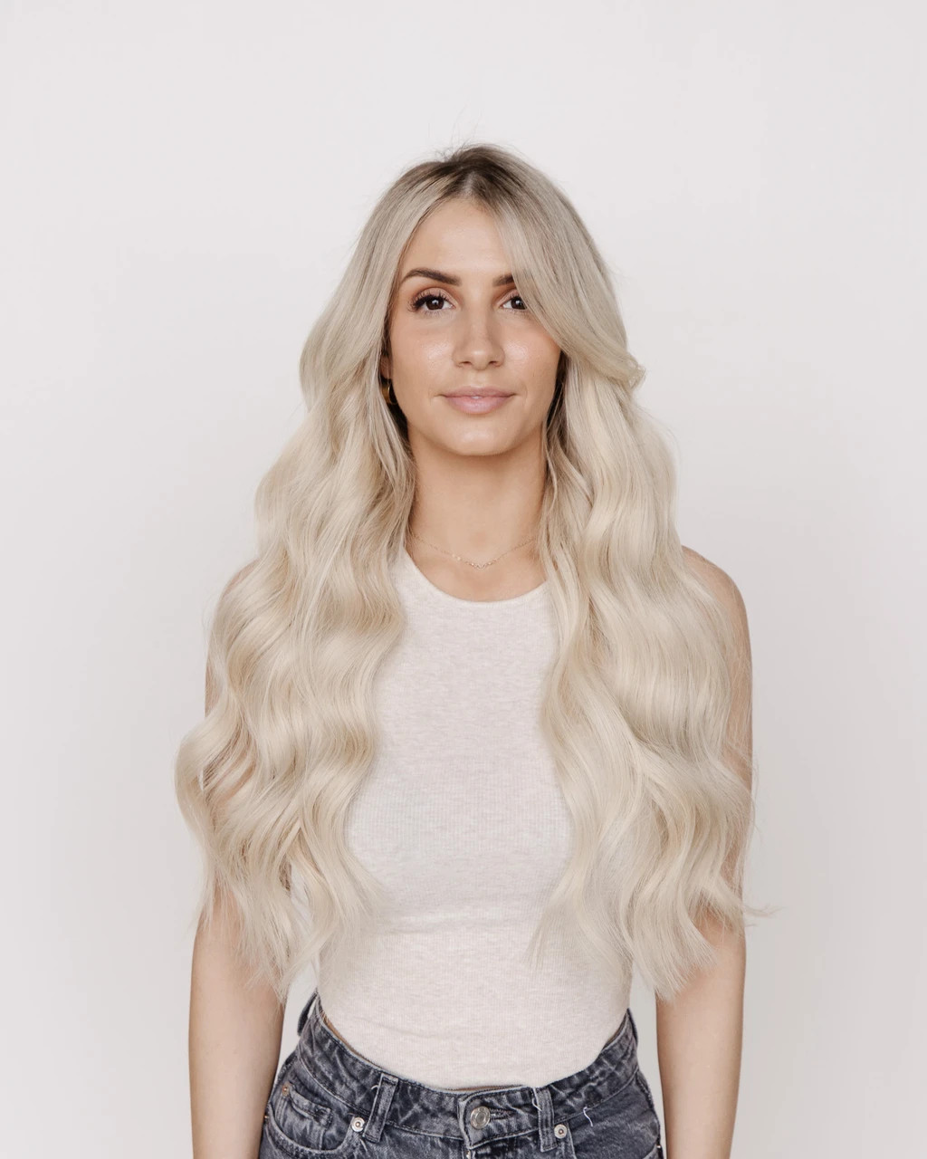 Platinum Blonde Loose Waves with Wispy Bangs — Hairstyles with Extensions