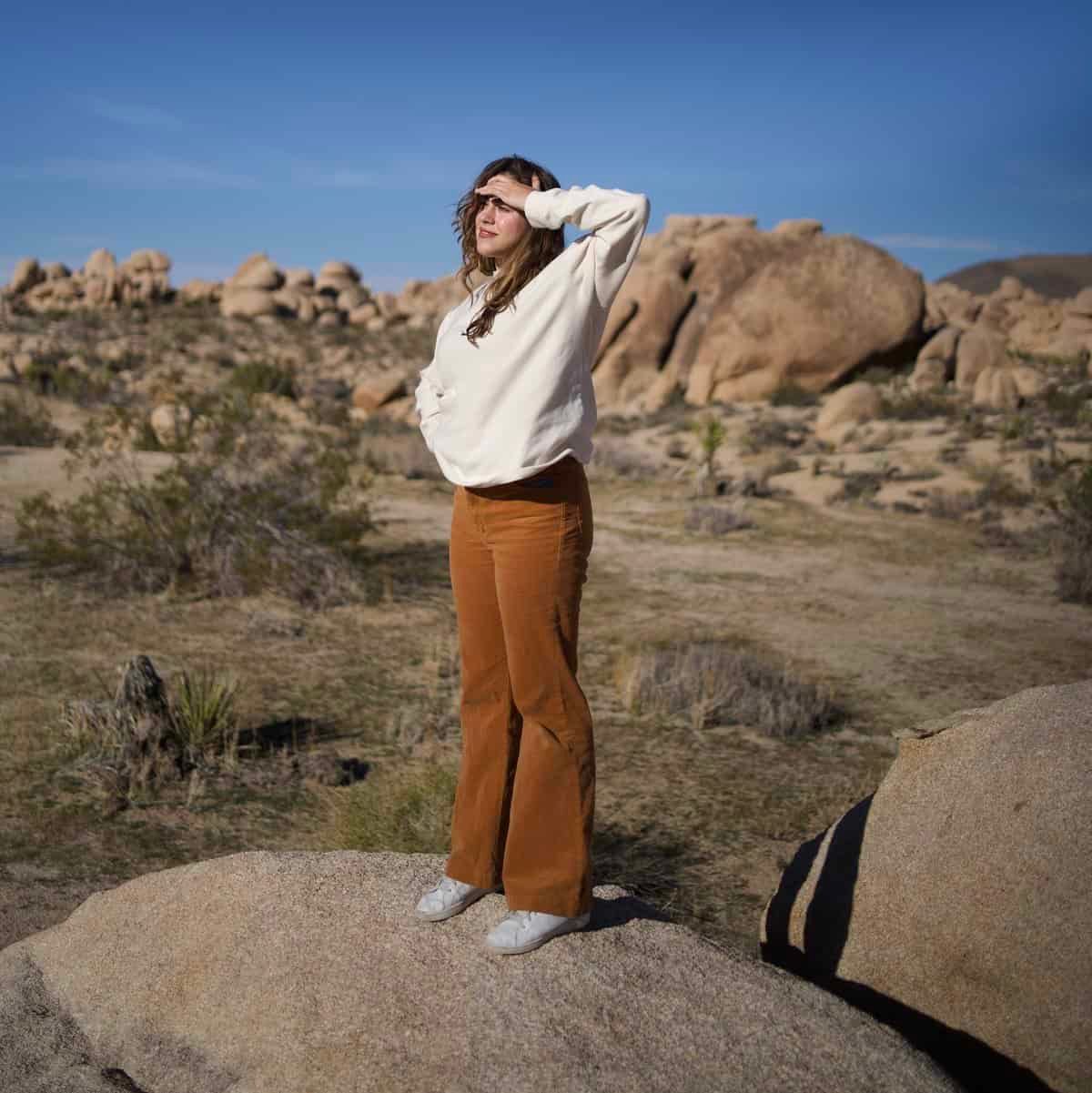 Casual Desert Travel: Cream Sweatshirt and Rust Corduroy Pants Casual Desert Travel: Cream Sweatshirt and Rust Corduroy Pants — Palm Springs Outfits