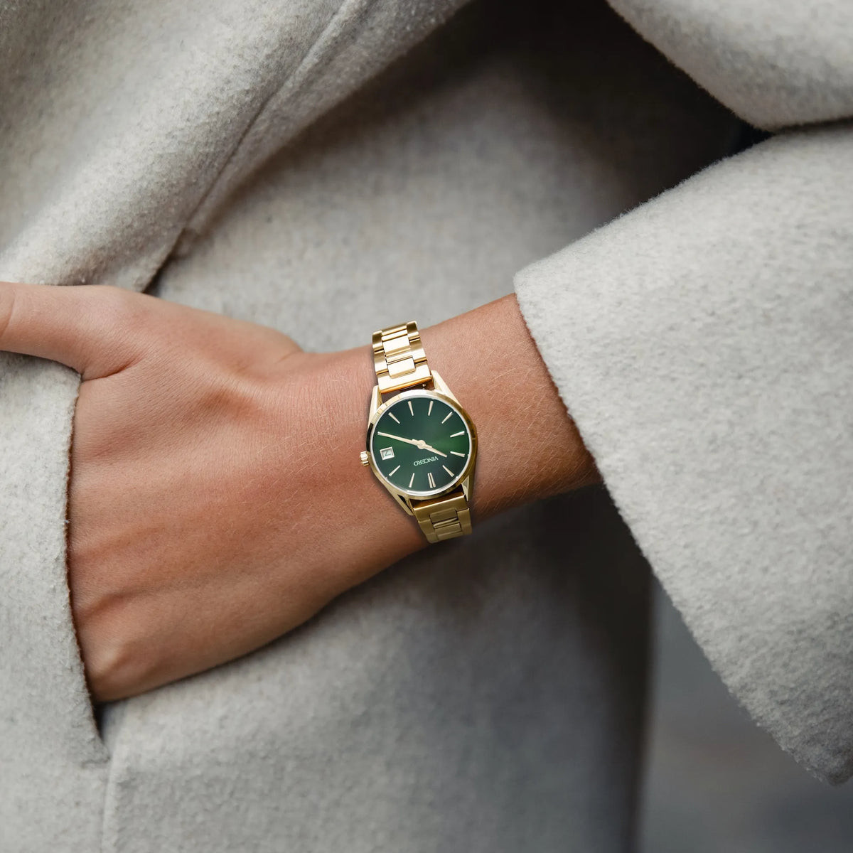 Gold Watch with Green Dial and Beige Coat — Gold Watches for Women