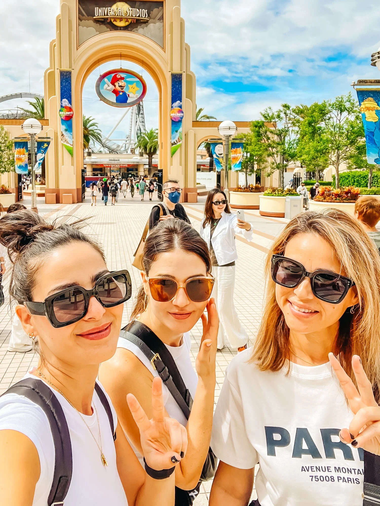 Chic All-White Ensemble with Wide-Leg Pants Chic All-White Ensemble with Wide-Leg Pants — Universal Studios Outfits