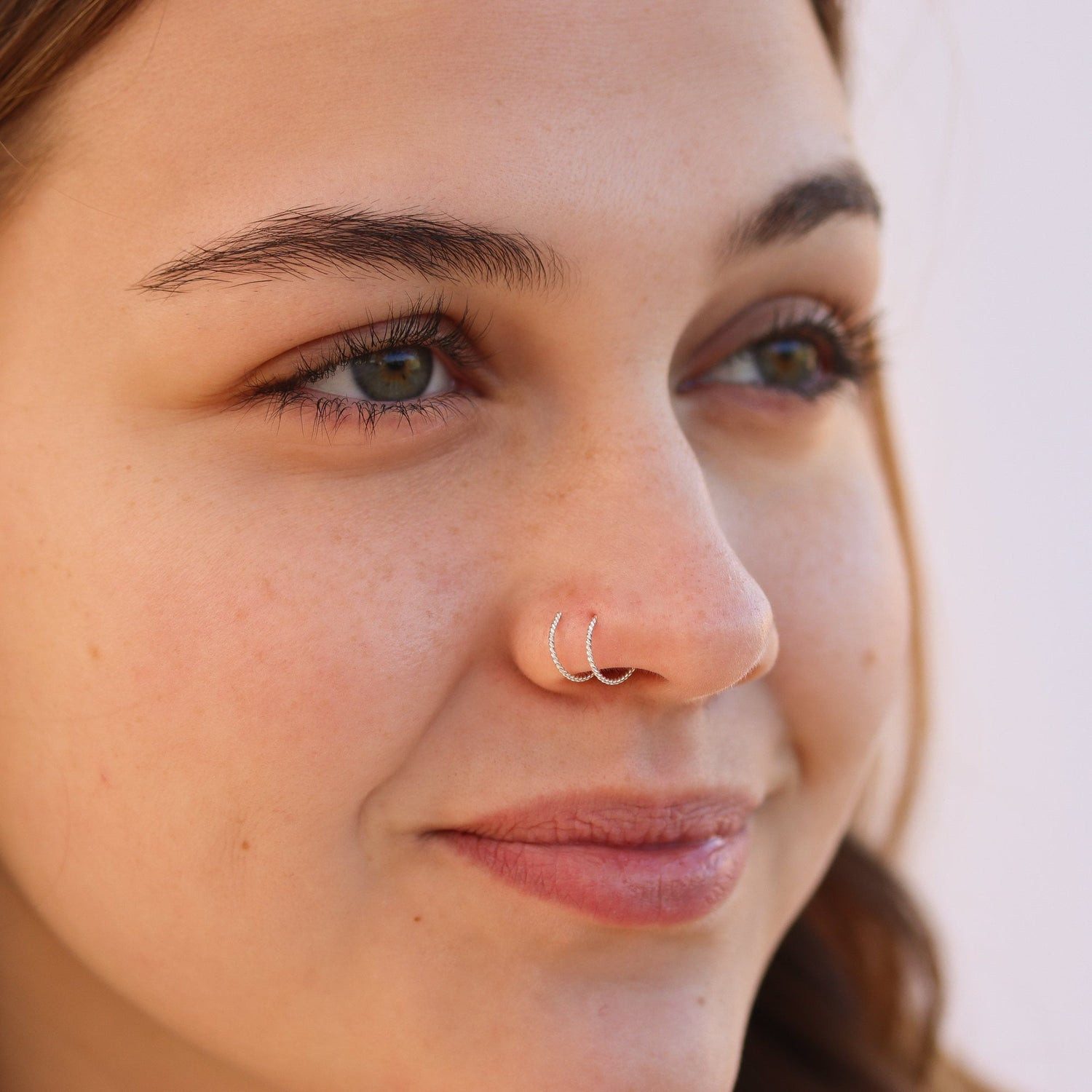 Double Stacked Silver Rings for a Unique Piercing Statement Double Stacked Silver Rings for a Unique Piercing Statement — Nose Piercing Ideas