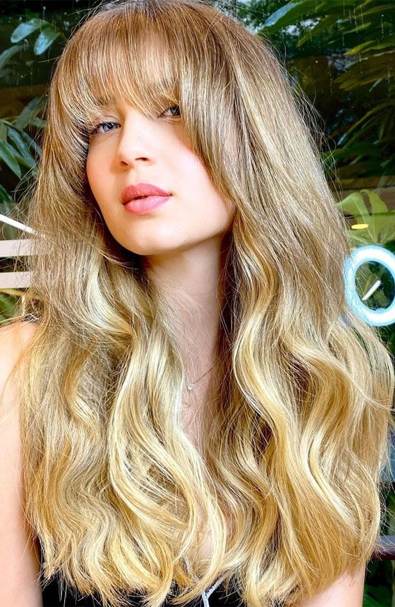 Mid-Back Waves With Full Fringe — Haircuts for Wavy Hair