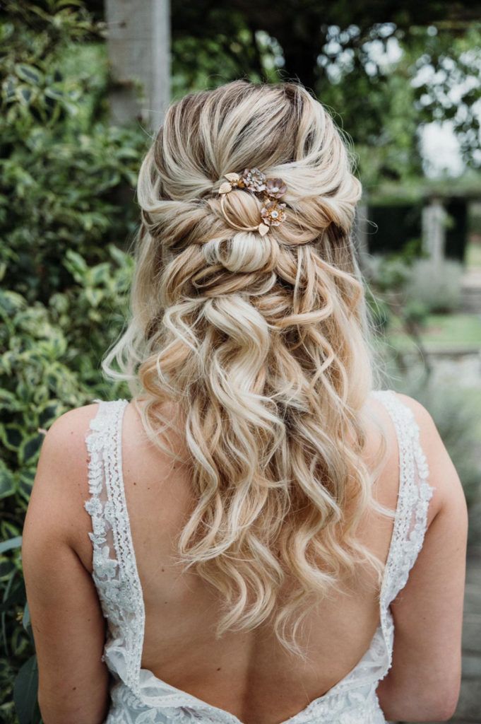 Blonde Half Updo With Floral Hairpiece Blonde Half Updo With Floral Hairpiece — Wedding Hairstyles for Curly Hair