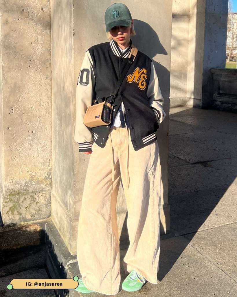 Oversized Varsity Jacket with Wide-Leg Trousers and Sneakers Oversized Varsity Jacket with Wide-Leg Trousers and Sneakers — Varsity Jacket Outfits