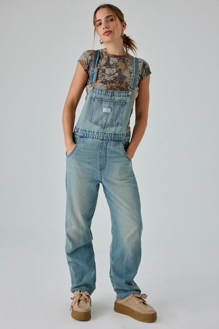 Light Blue Oversized Denim Overalls with Patterned T-Shirt and Platform Sneakers Light Blue Oversized Denim Overalls with Patterned T-Shirt and Platform Sneakers