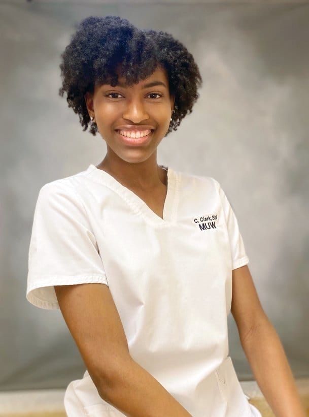 Natural Black Curly Shoulder Cut — The Parting Is In The Middle Natural Black Curly Shoulder Cut — The Parting Is In The Middle — Hairstyles for Nurses
