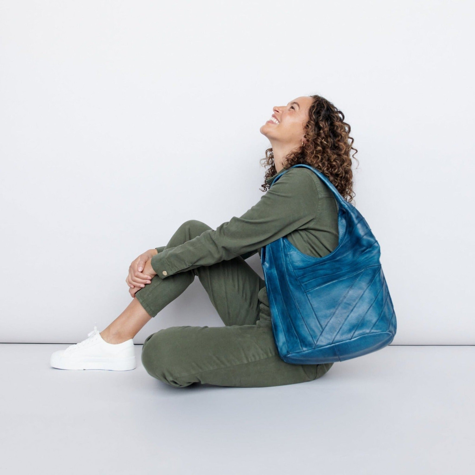 Blue Quilted Leather Hobo Bag with Olive Green Jumpsuit — Hobo Bag Outfits