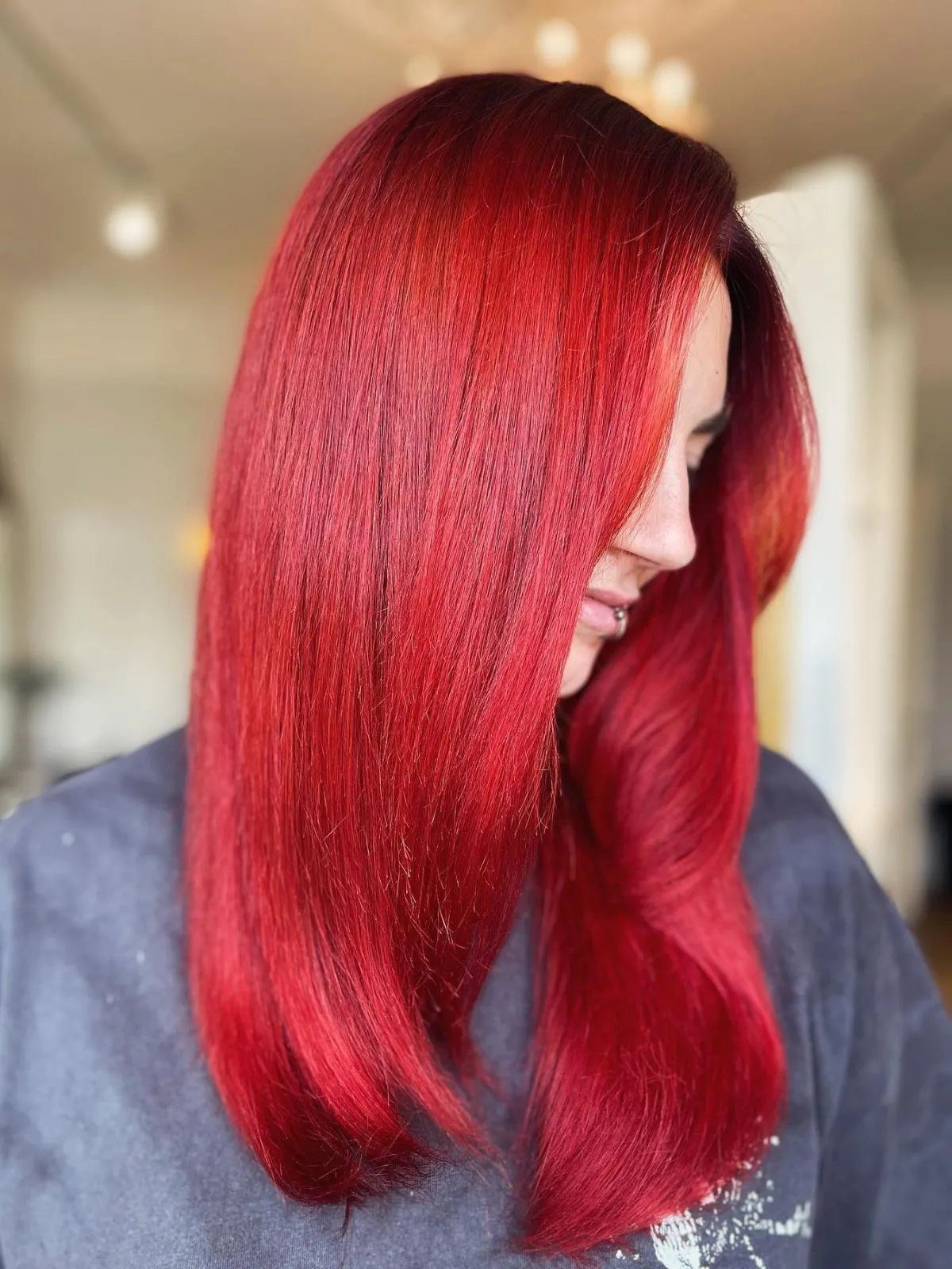 Vibrant Red Collarbone Blowout — Bright Red Hair