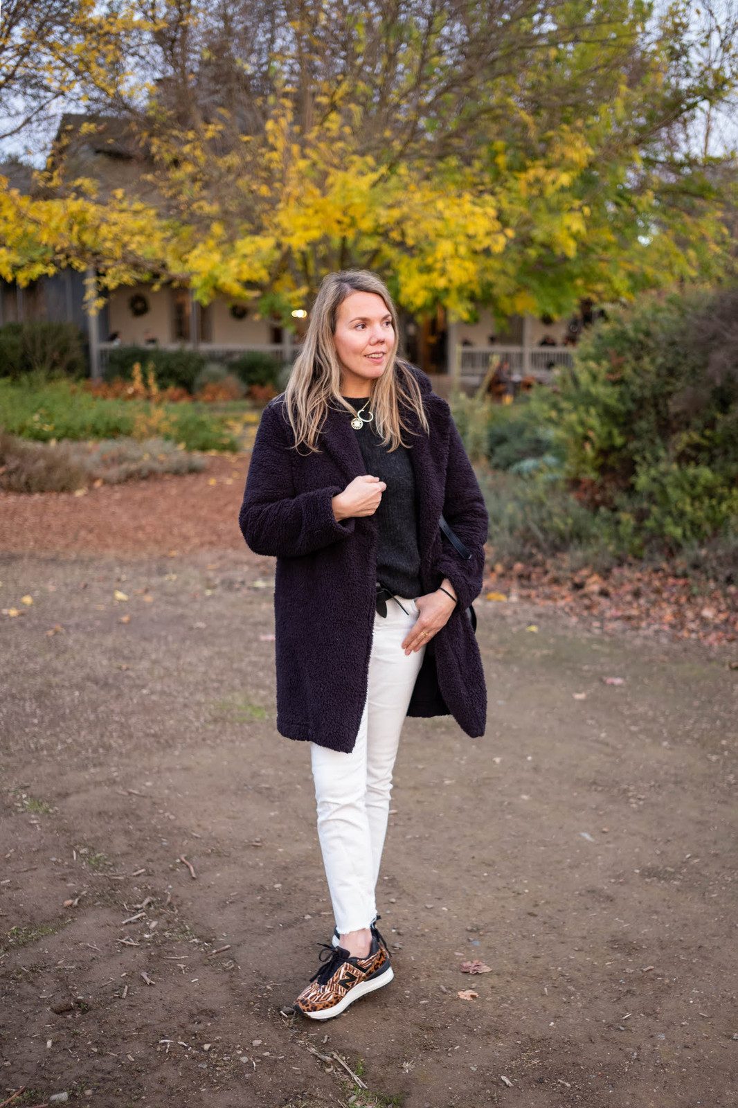 Textured Dark Coat Over Knit Sweater and Trousers for Wine Tasting Textured Dark Coat Over Knit Sweater and Trousers for Wine Tasting — Wine Tasting Outfits