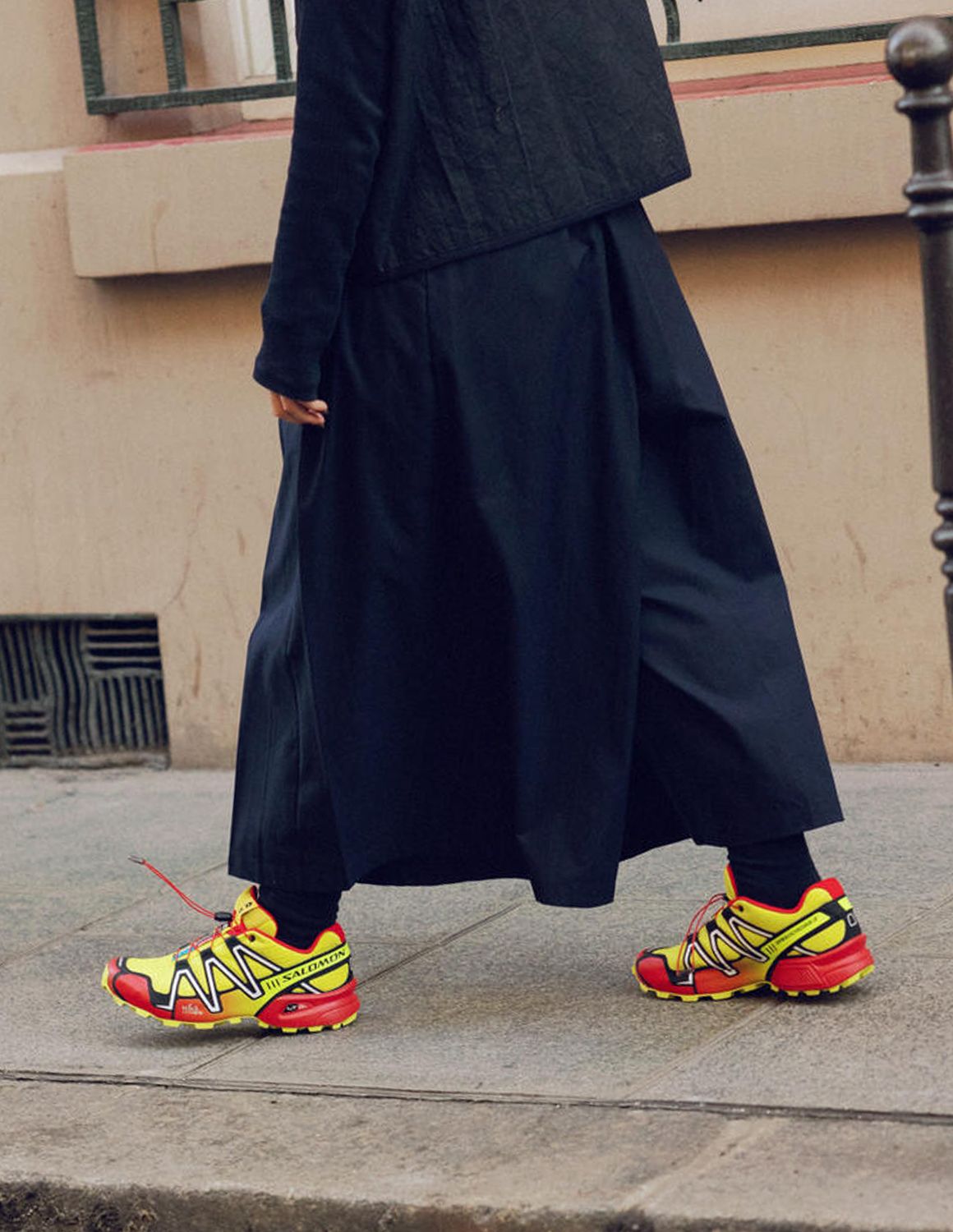 Outdoor Adventure: Wide-Leg Skirt and Quilted Jacket with Bright Salomon Shoes Outdoor Adventure: Wide-Leg Skirt and Quilted Jacket with Bright Salomon Shoes — Salomon Outfits
