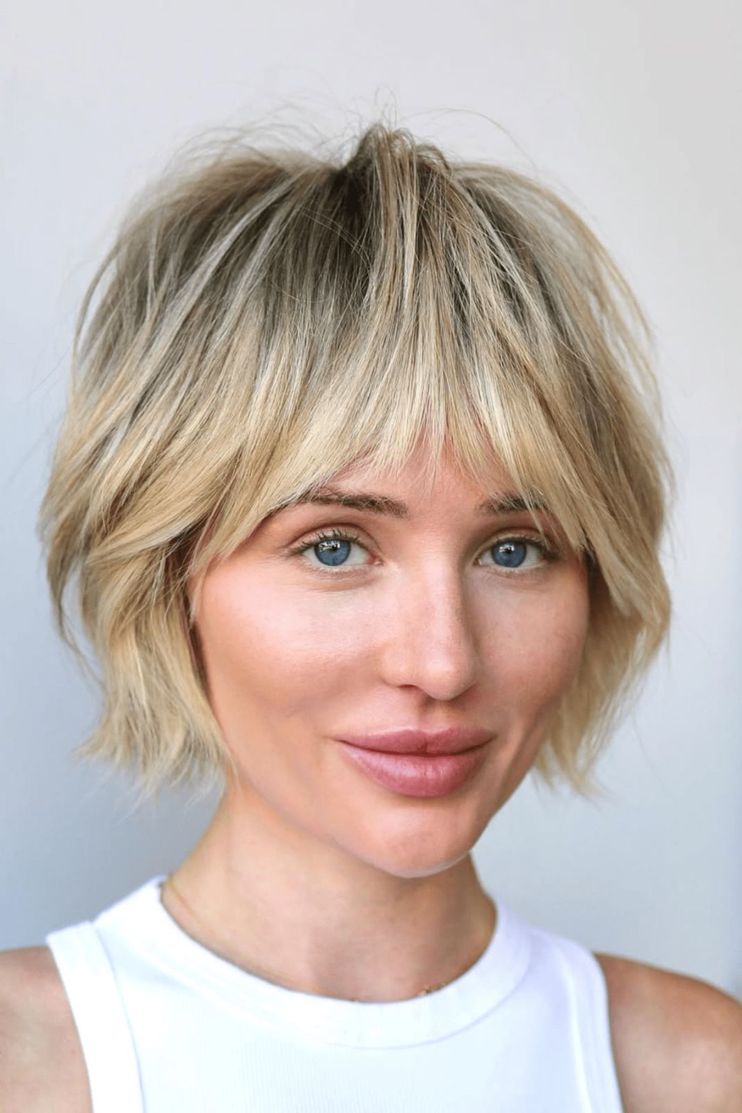 Honey Blonde Shag Bob With Blunt Bangs — Short Shag